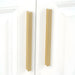 brass gold edge handles white furniture